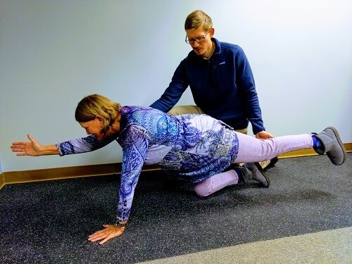 Image of Chiropractor Wheaton performing rehabilitation
