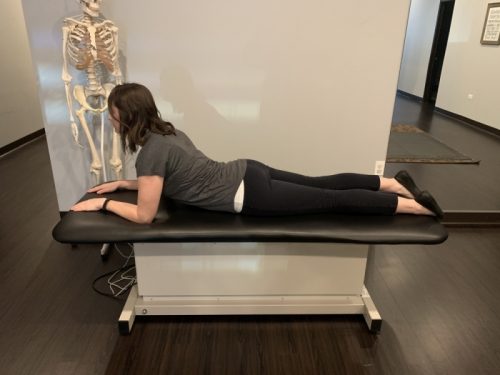 tummy time, prone lying in lumbar extension